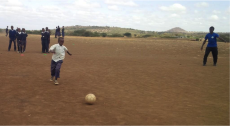 CtC members on football training session. At the back, the other group warming up