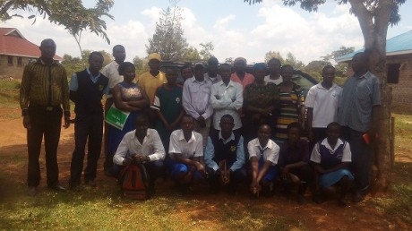 Some of the students and their guardians in a group photo after a meeting