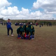 Kisongo Caldicott 1 huddle before kick-off
